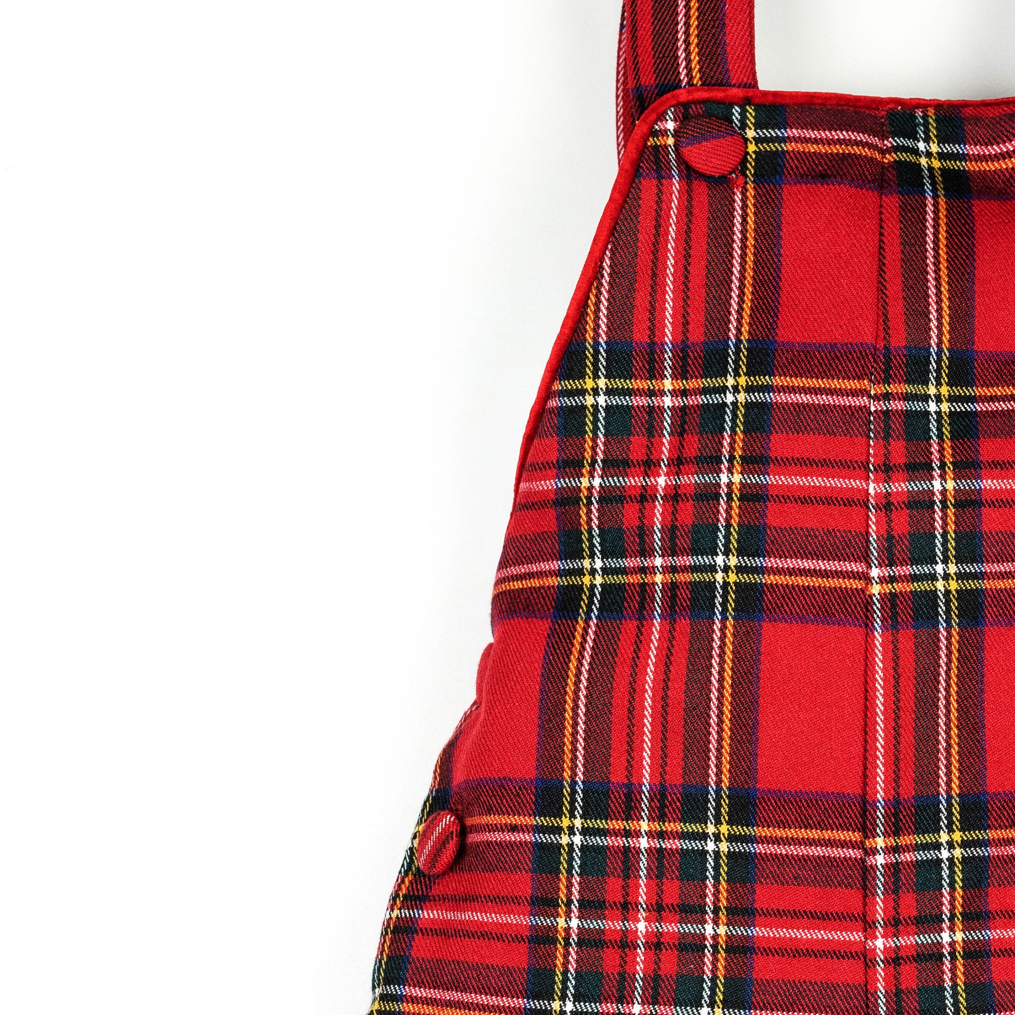 Salopette in tartan rosso con profilo rosso