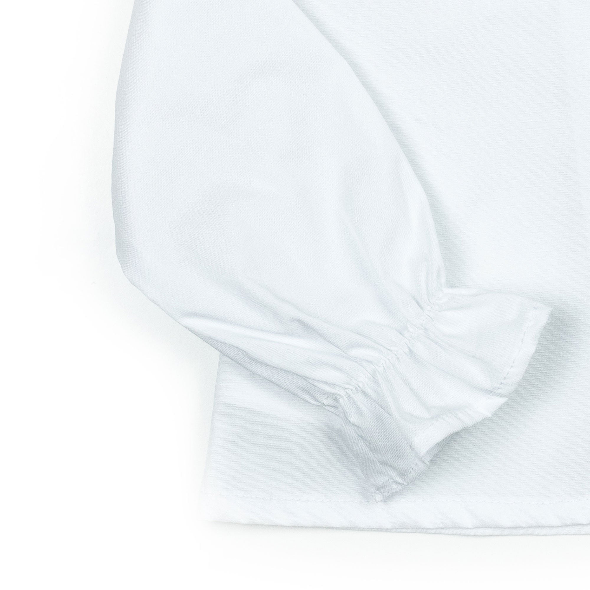 Camicia con collo rouches in piquet bianco