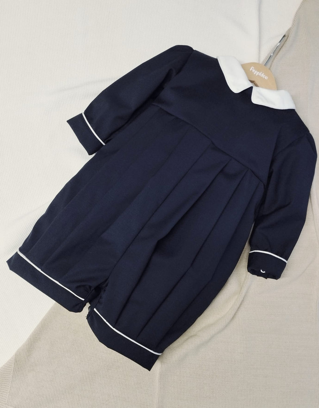 Romper with round collar and contrasting trim