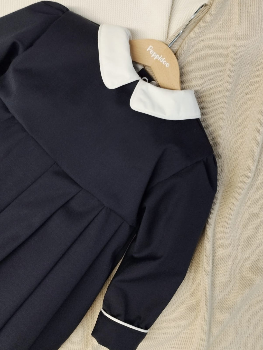 Romper with round collar and contrasting trim