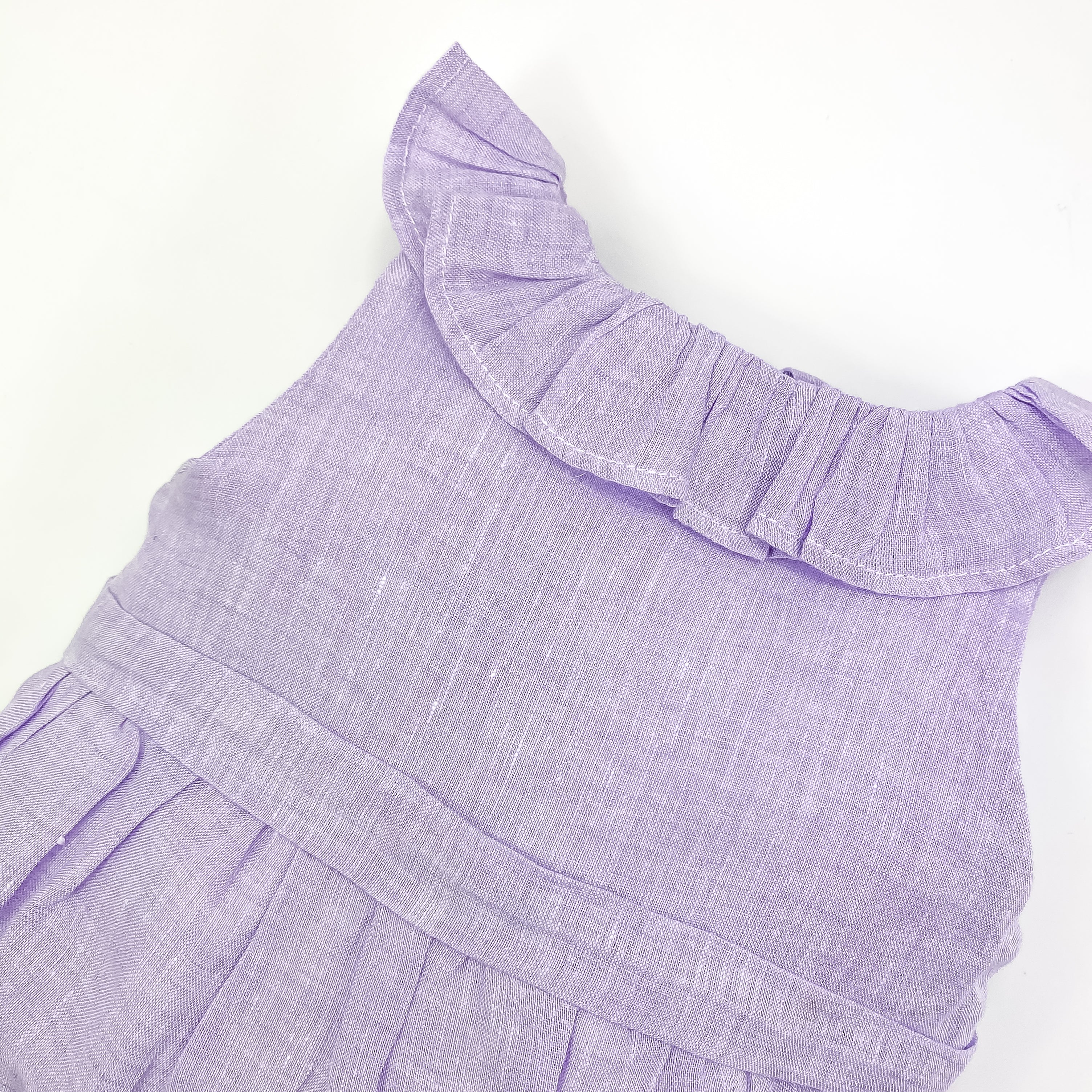 Pagliaccetto con rouches lino lilla