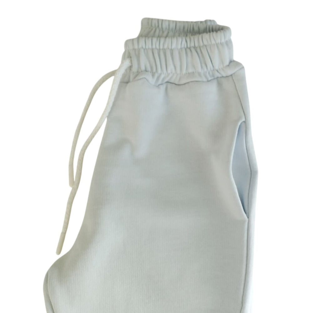 Pantaloni tuta bambino/a celeste chiaro