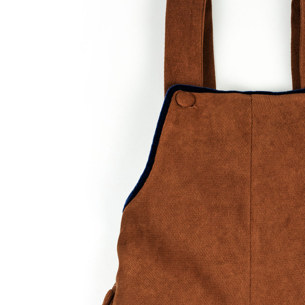 Salopette in velluto marrone con profilo blu