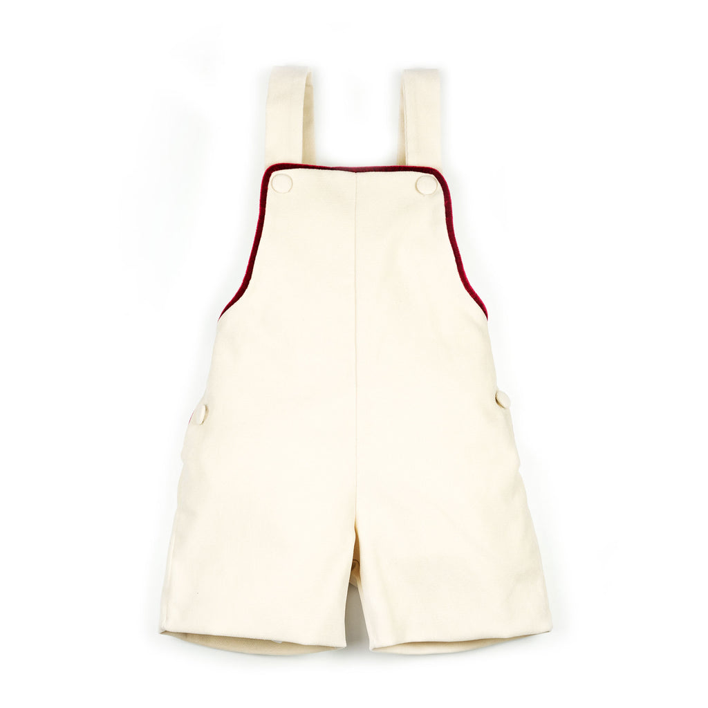 Salopette in velluto panna con profilo rosso