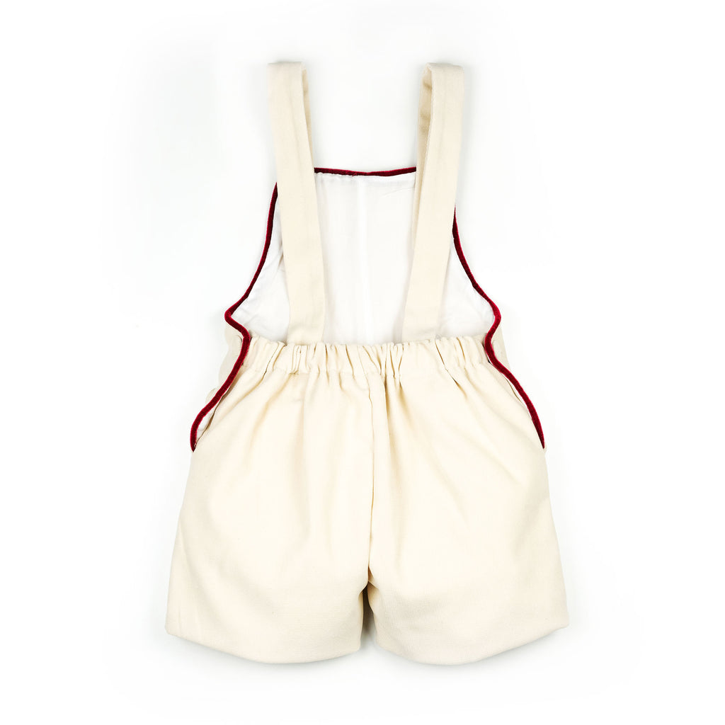 Salopette in velluto panna con profilo rosso