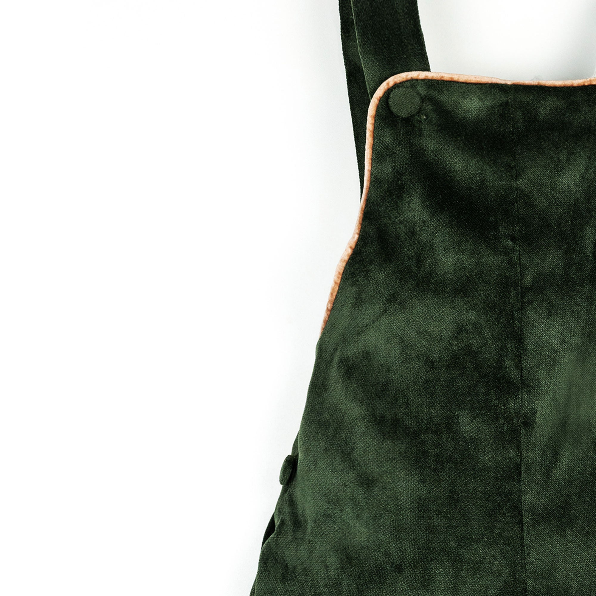 Salopette in velluto verde con profilo beige