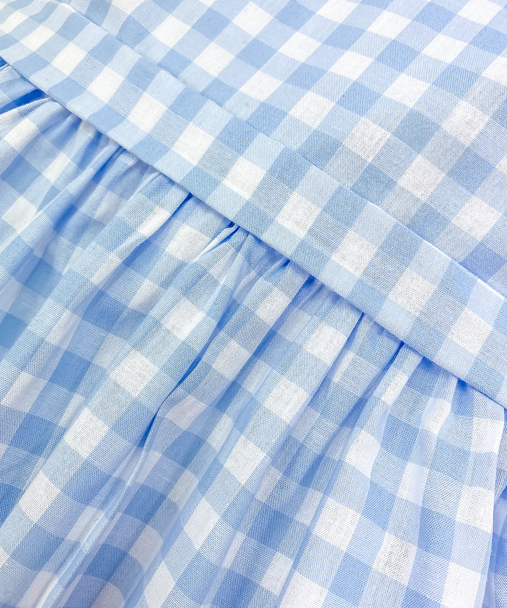 Vestito a quadri celeste