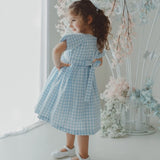 Vestito a quadri celeste
