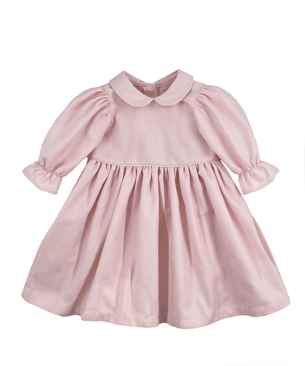 Vestito rosa con manica a sbuffo e profili a contrasto