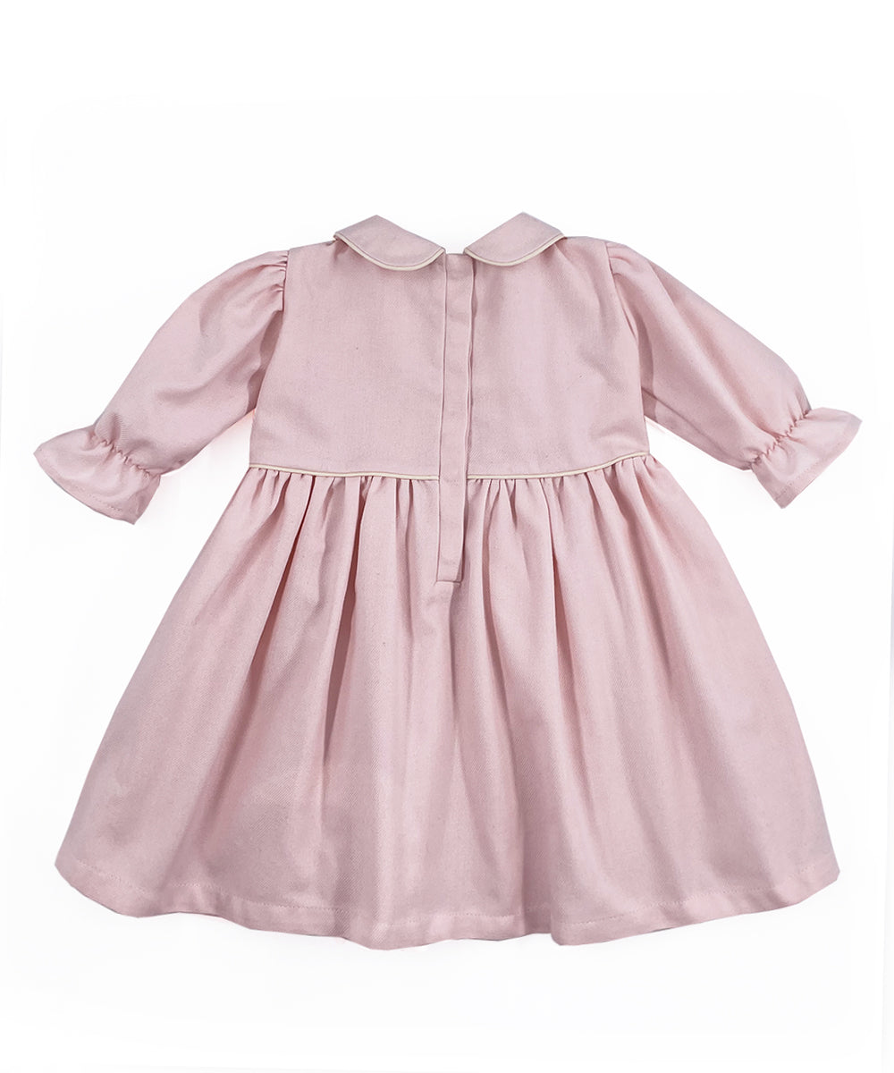 Vestito rosa con manica a sbuffo e profili a contrasto